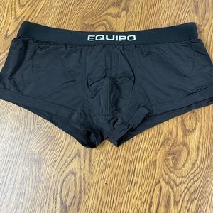 Mens worn poly spandex trunks Size M